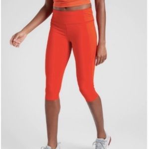 Athleta Velocity Crop Stash Pocket Leggings Orange